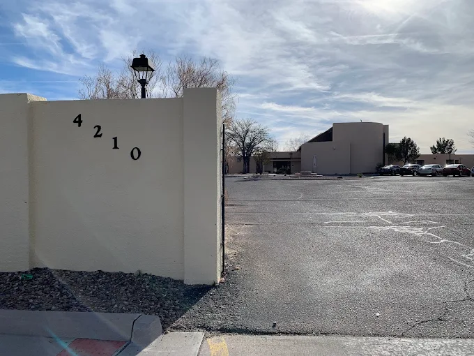 Exterior entrance and parking area at New Mexico Wellness