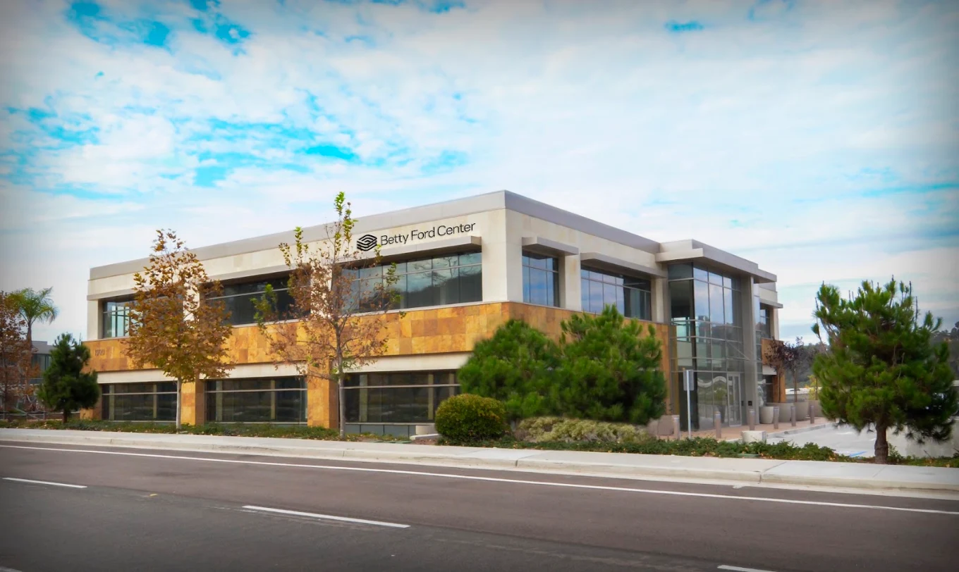 Exterior of the Betty Ford Center in San Diego, featuring a modern two-story building with large windows and landscaped grounds