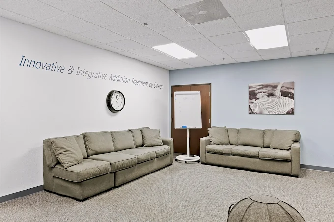 Private counseling office with seating and large window