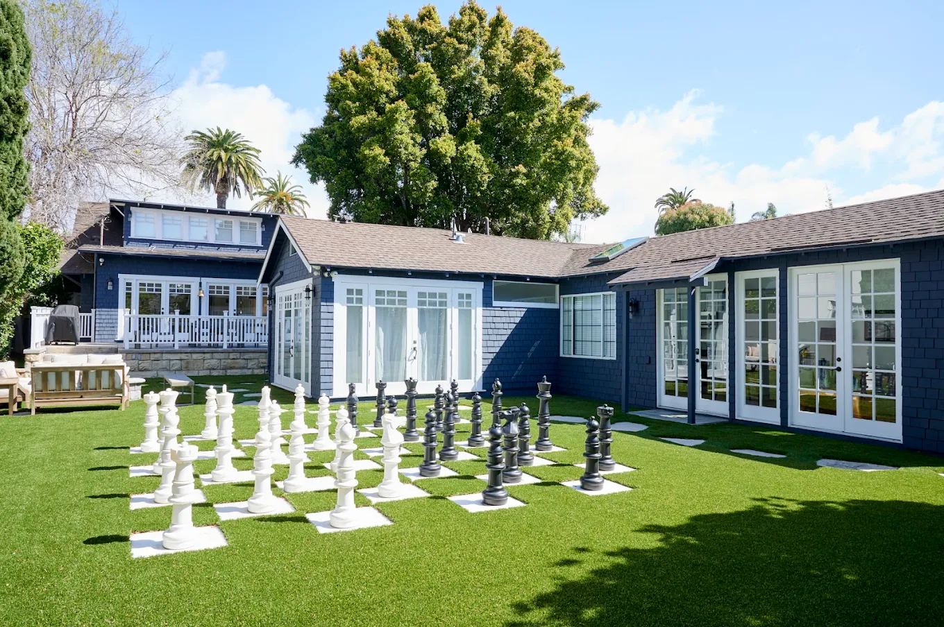 Lawn with large black and white chess pieces