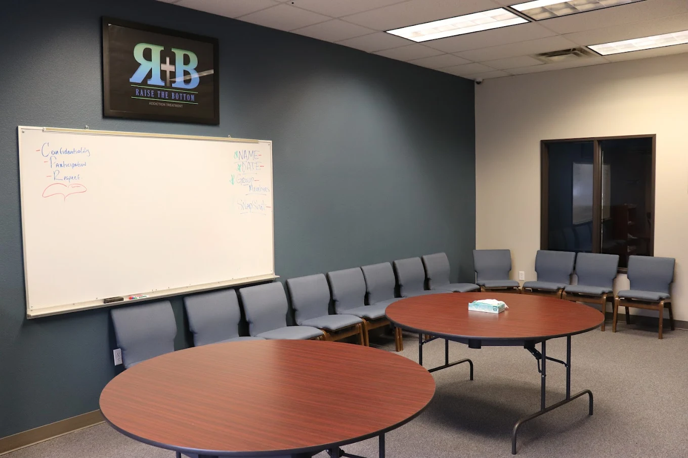 Chairs and tables arranged for group therapy session