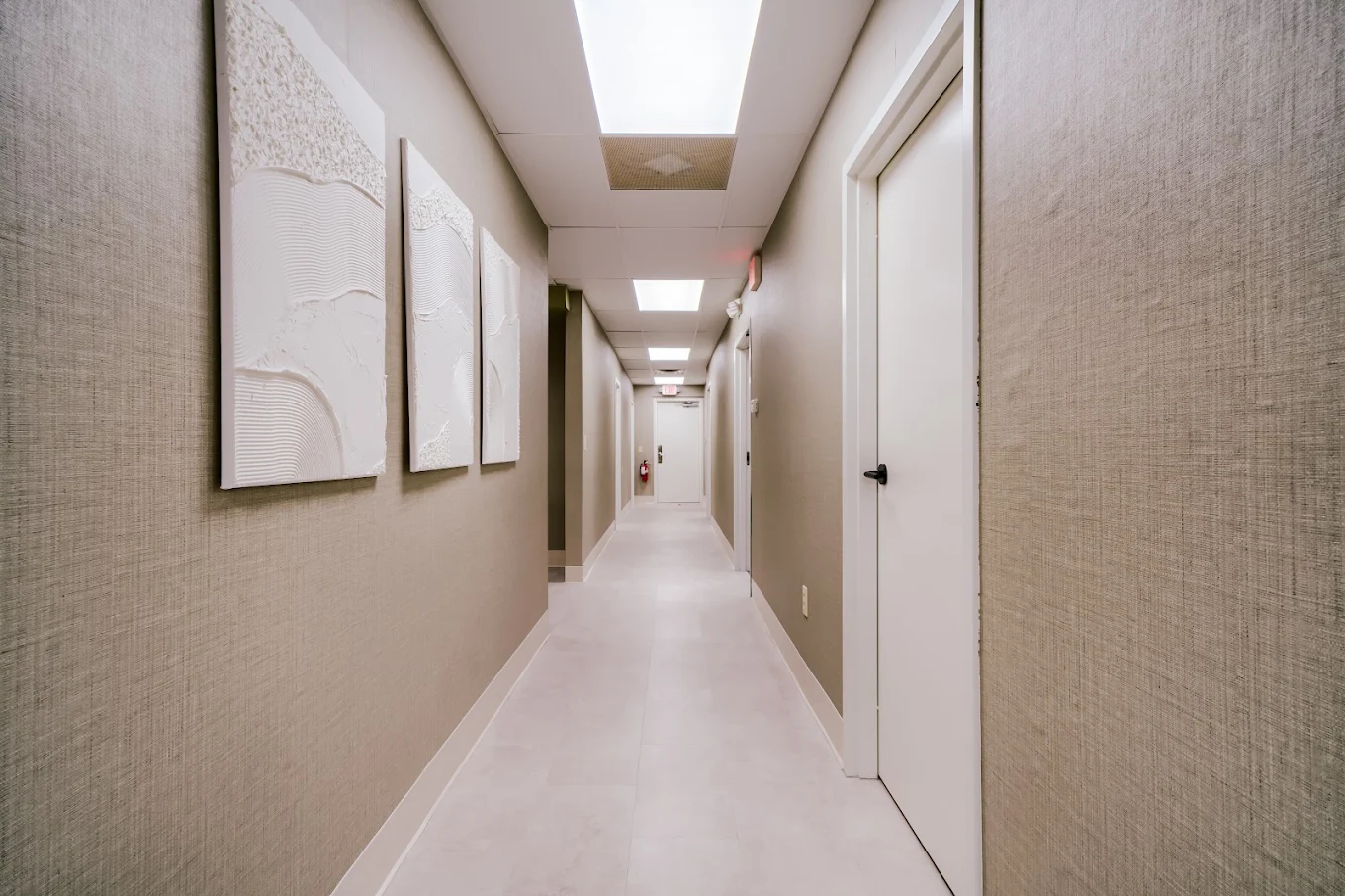 Clean hallway leading to treatment rooms