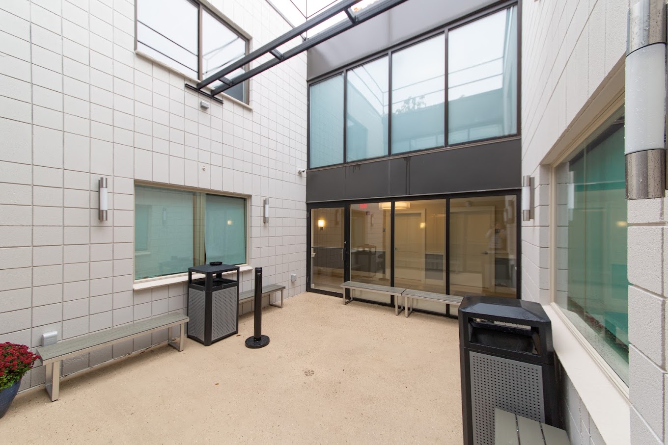 Outdoor area with benches natural light.