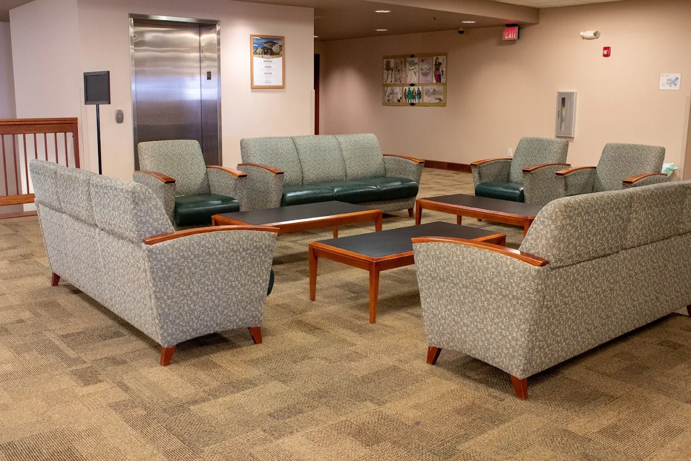 Comfortable lounge with sofas, chairs, and tables