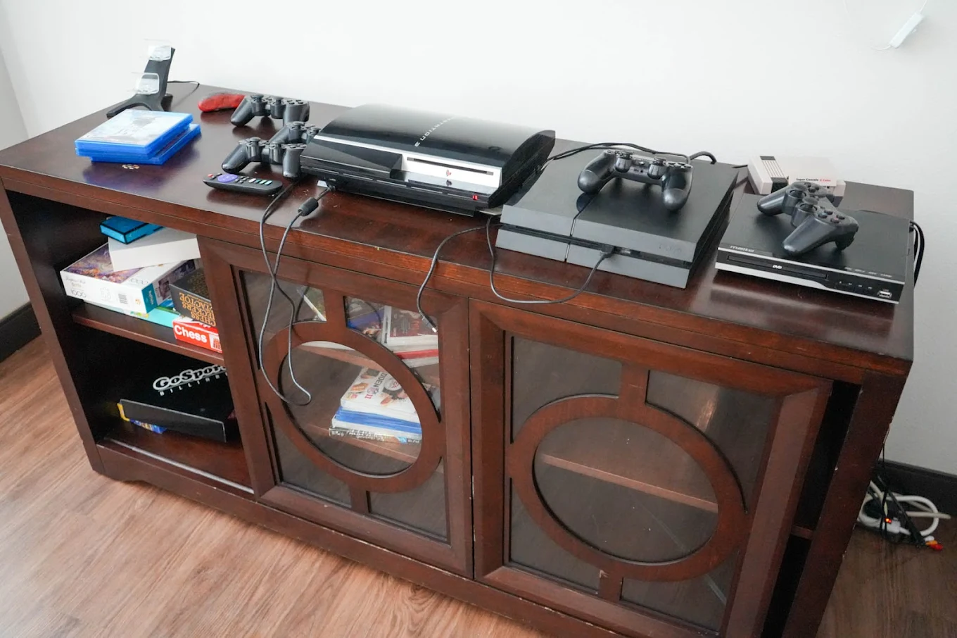 Gaming consoles and board games in teen playroom