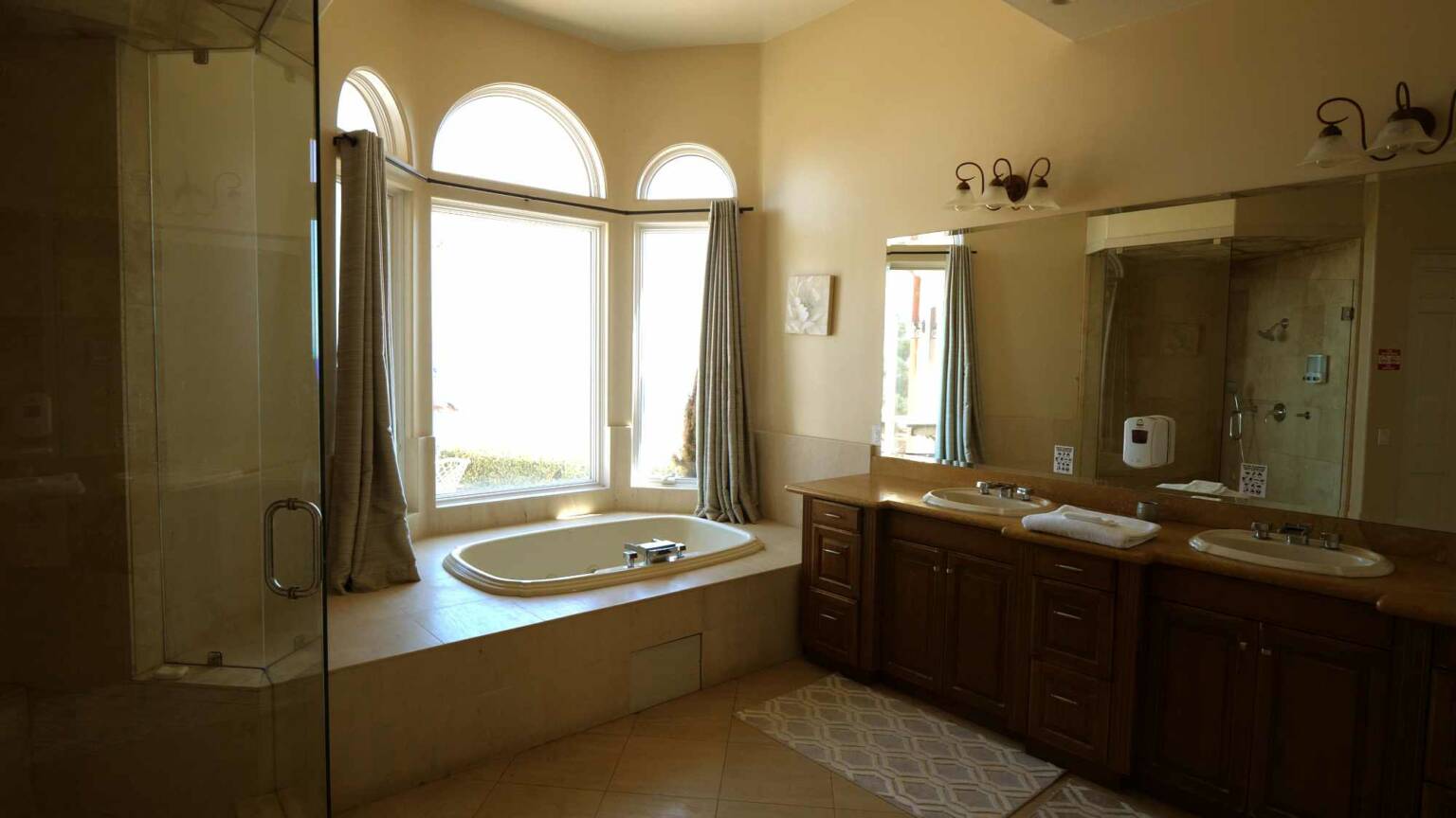 Spacious bathroom with soaking tub and double sinks