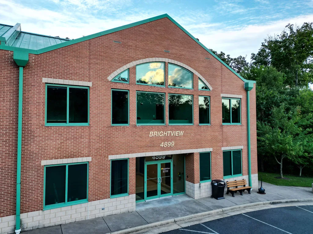 Front entrance of the brick BrightView Woodbridge center