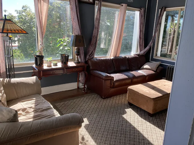 Cozy lounge with sofas and natural light