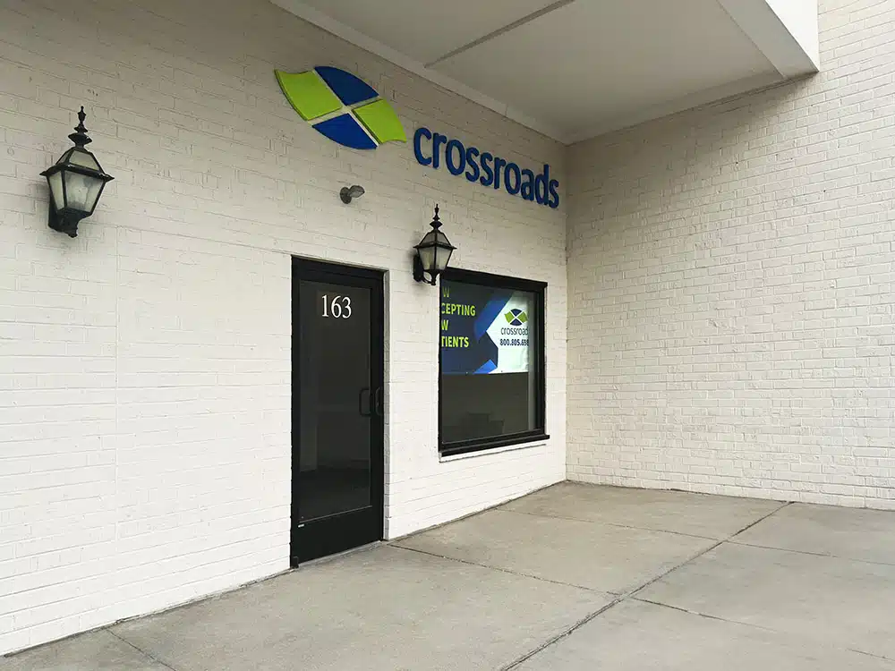 Crossroads treatment center entrance with signage and door