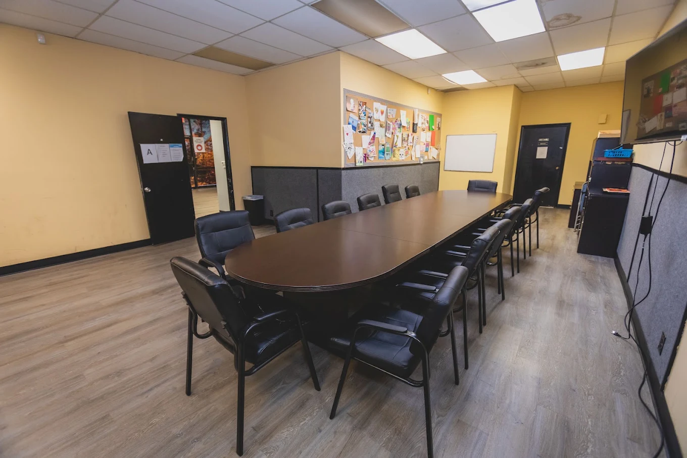 Conference room with long table and chairs