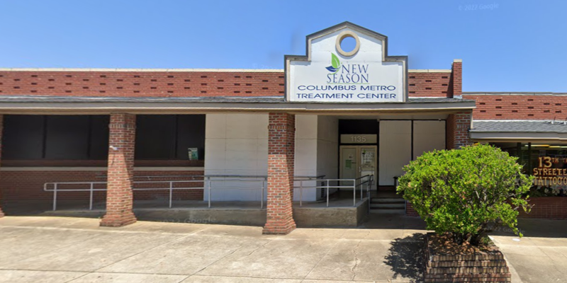  A welcoming treatment center with a brick exterior, clear signage, and a ramp for accessibility, offering a professional and supportive environment.