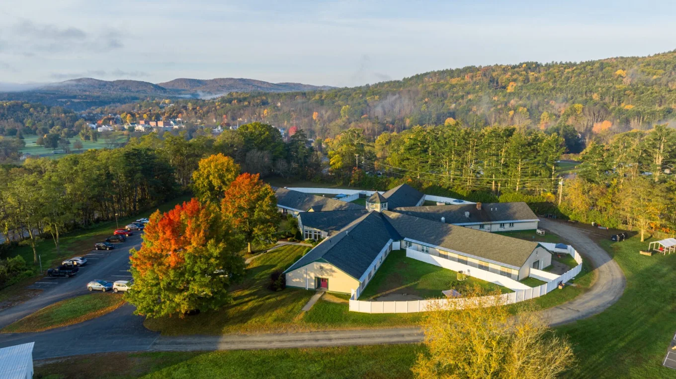 Aerial view of Valley Vista campus surrounded by wooded hills