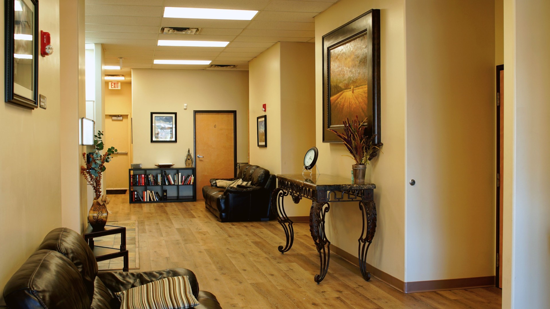 Hallway with seating and a cozy reading nook.