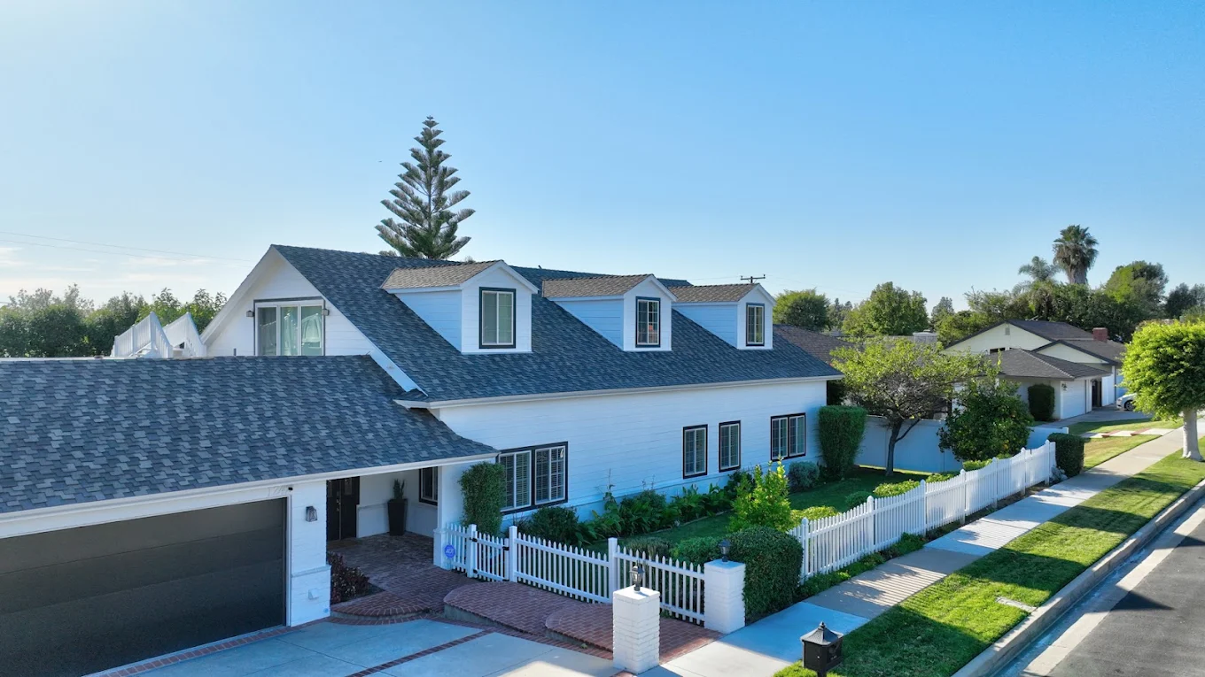 Residential-style facility with front lawn and picket fence