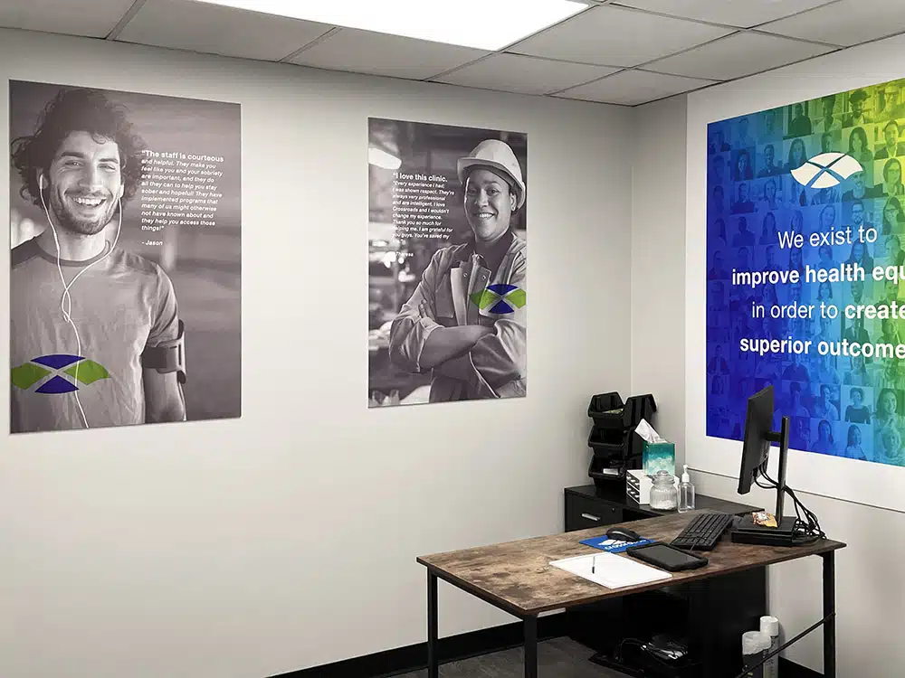 Office with desk, computer, and motivational posters