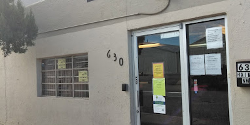 Entrance of a treatment center at 630, featuring a glass door and clear signage, creating an accessible and inviting entry for visitors.