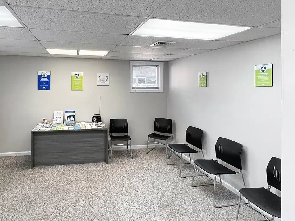 Waiting room with chairs and brochure display table