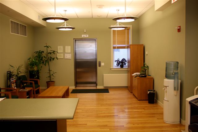 Office space with elevator access and seating area