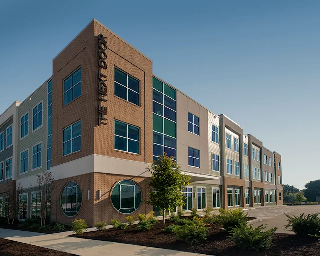 Multi-story brick facility with modern windows