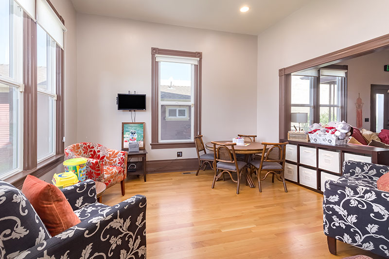 Lounge area with seating and tables for group activities