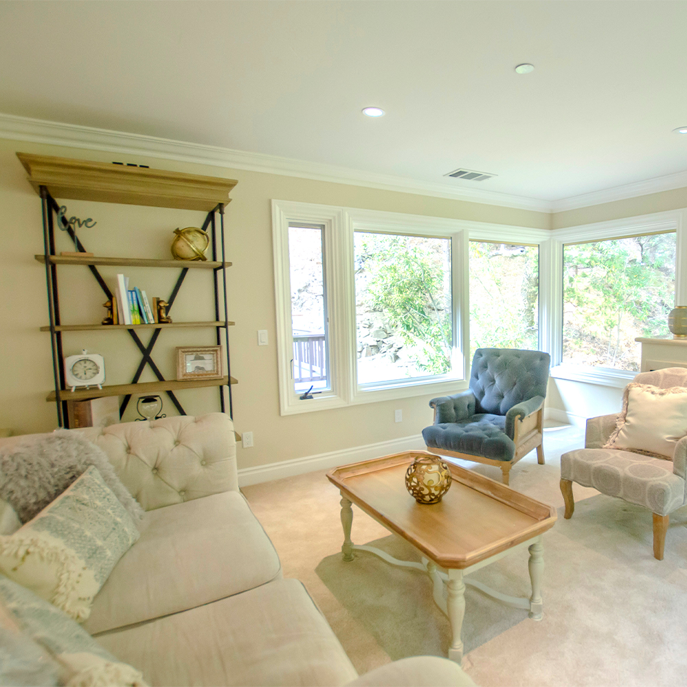 Lounge with seating and a table.