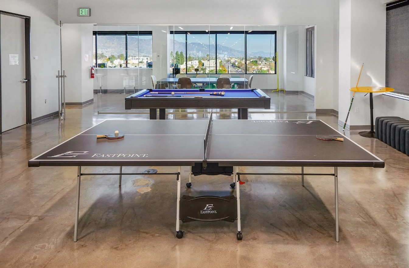 Recreation room with ping pong and pool tables