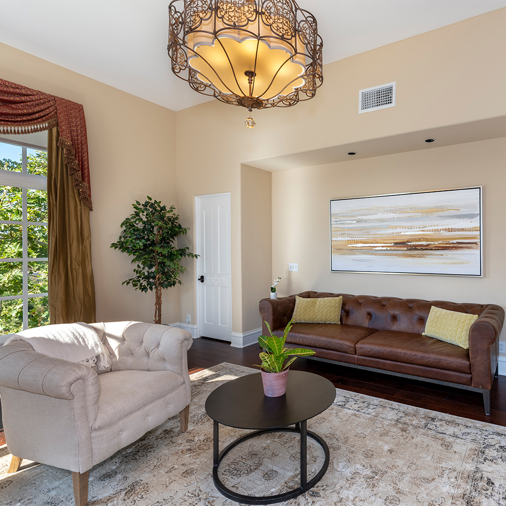 Lounge with seating and a table.