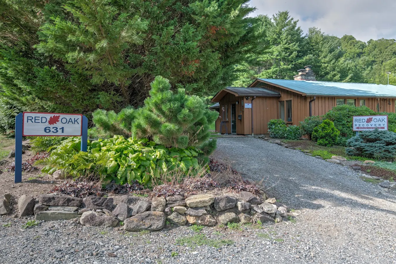 Facility entrance with Red Oak Recovery signage and walkway
