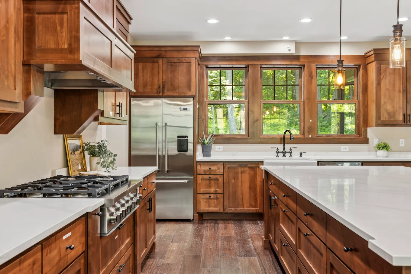 Spacious kitchen with wood cabinets and island