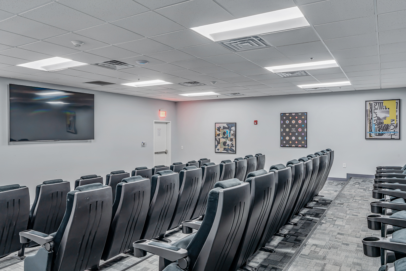Screening room with theater-style seating