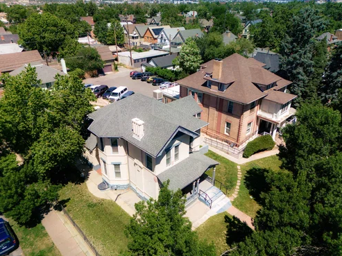 Aerial view of facility buildings in neighborhood