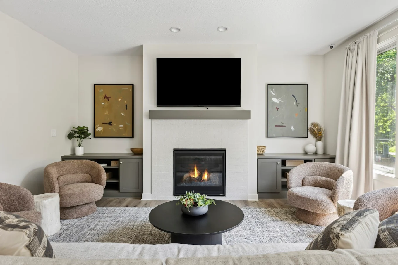 Cozy living room with fireplace and TV