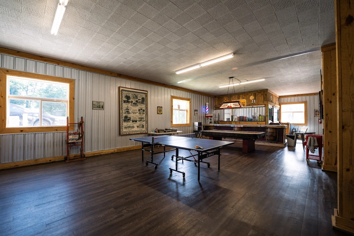 Recreation room with ping pong table and seating