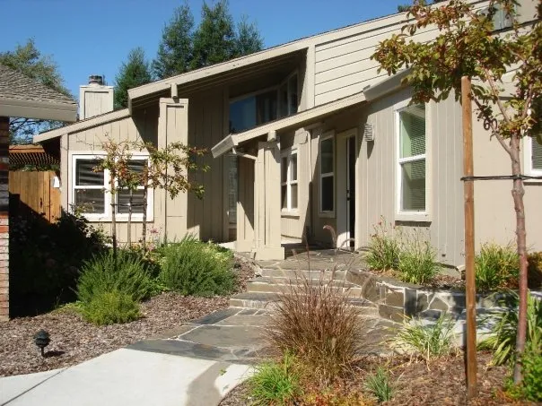 Stone walkway leading to entrance of residential rehab home