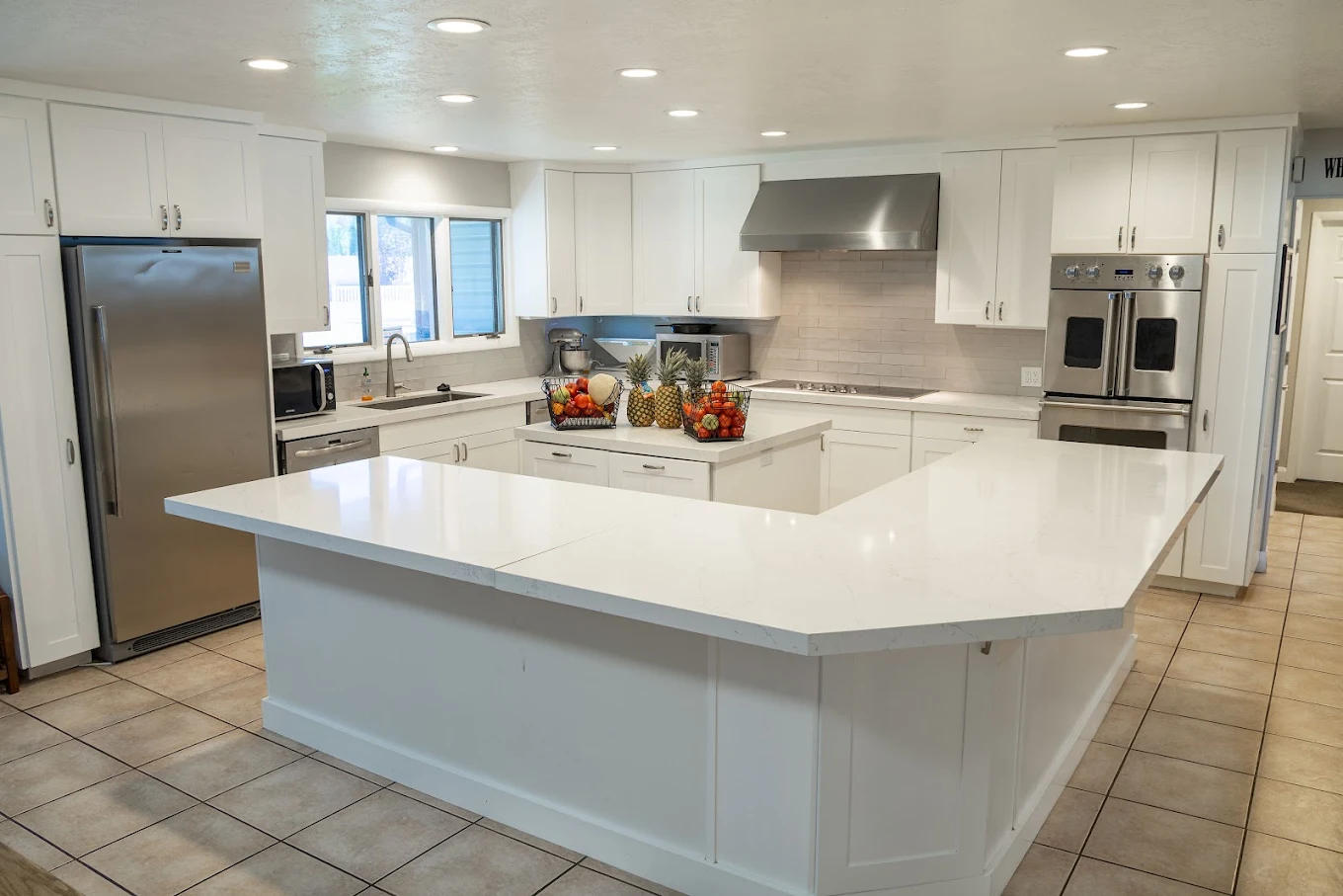 Bright kitchen and island at Deer Hollow Mountainside residence