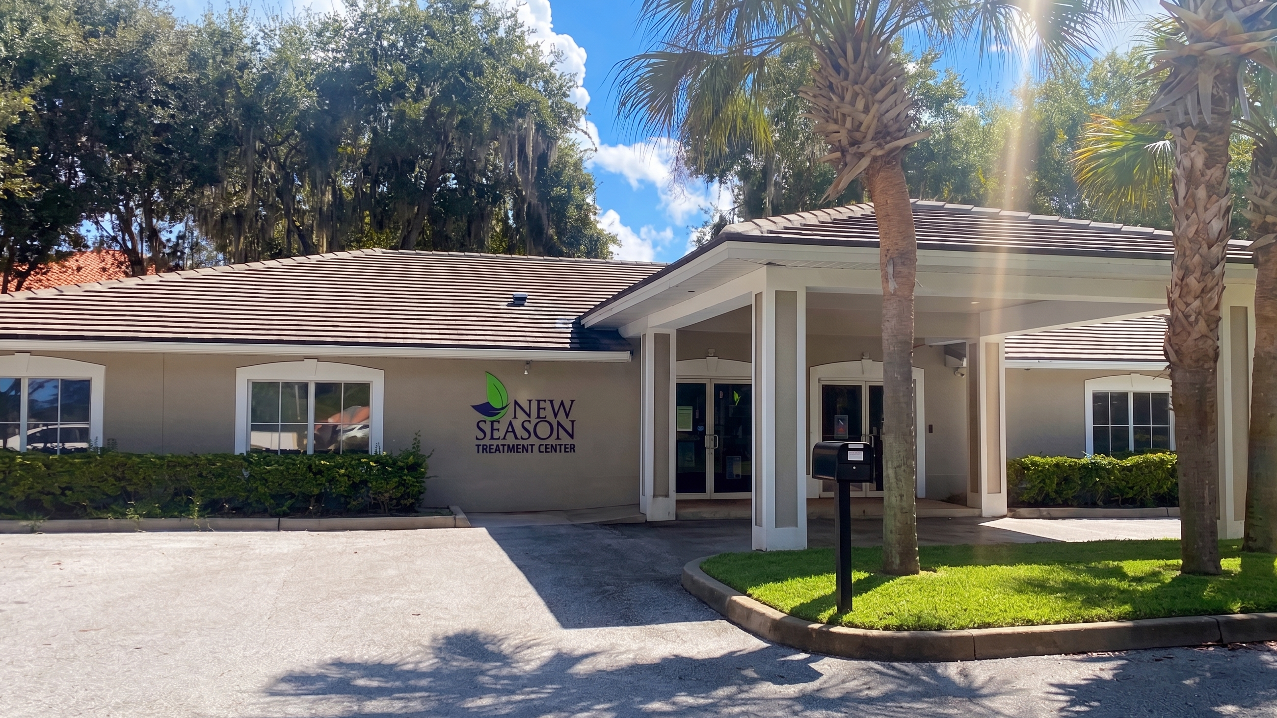 Outside facility entrance with walkway to door.