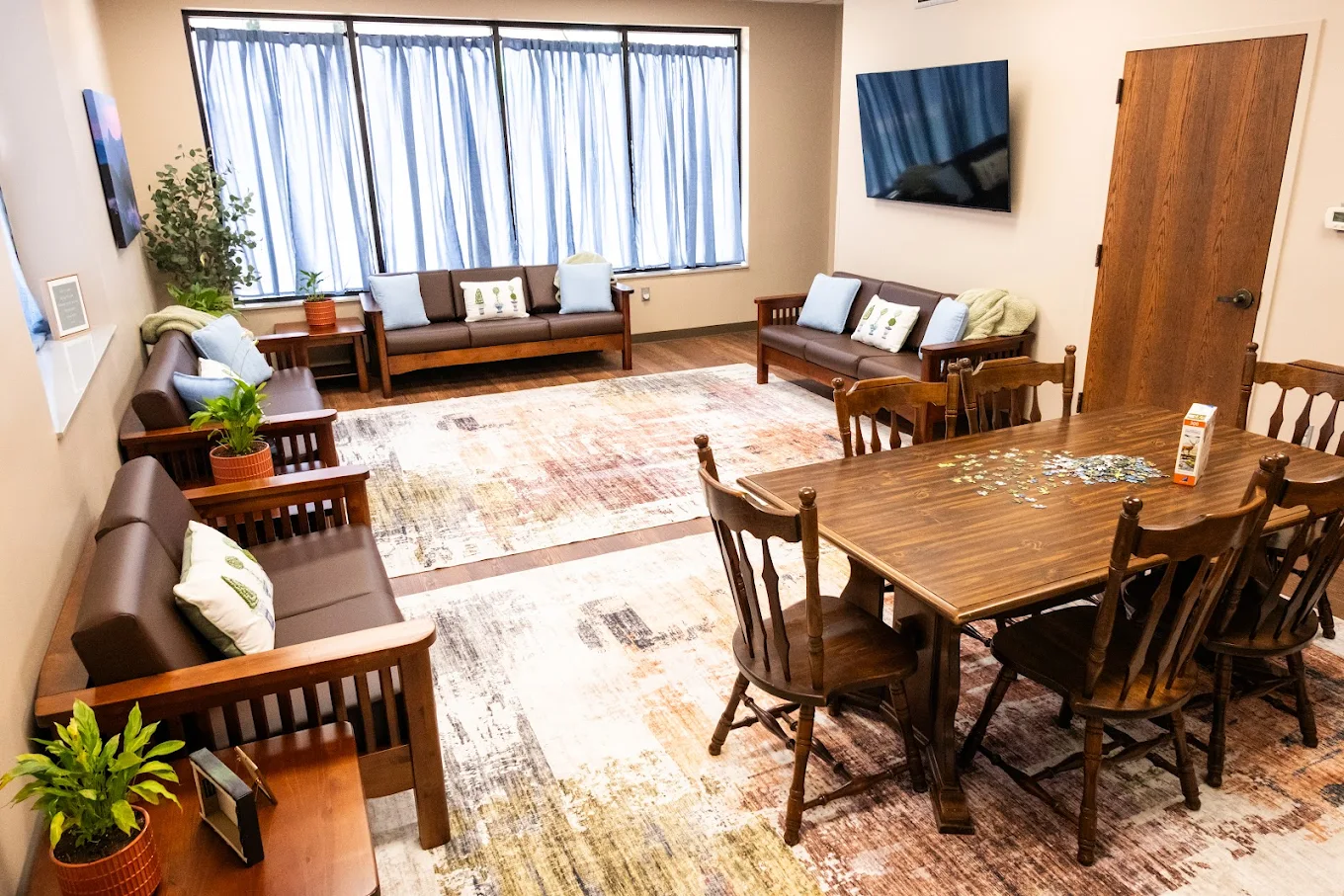 Recreation lounge with seating and game table