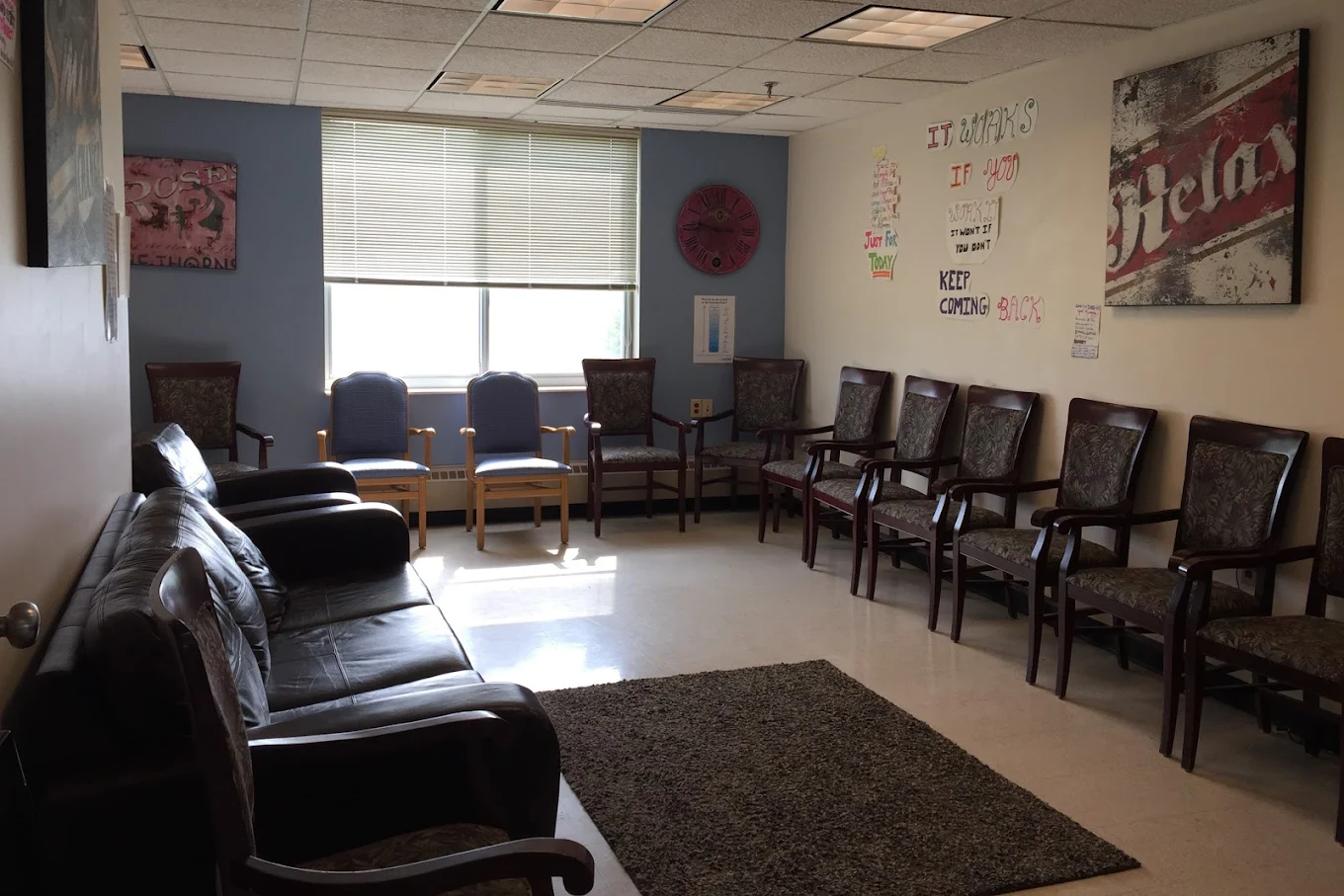 Group therapy room with chairs arranged for group discussion