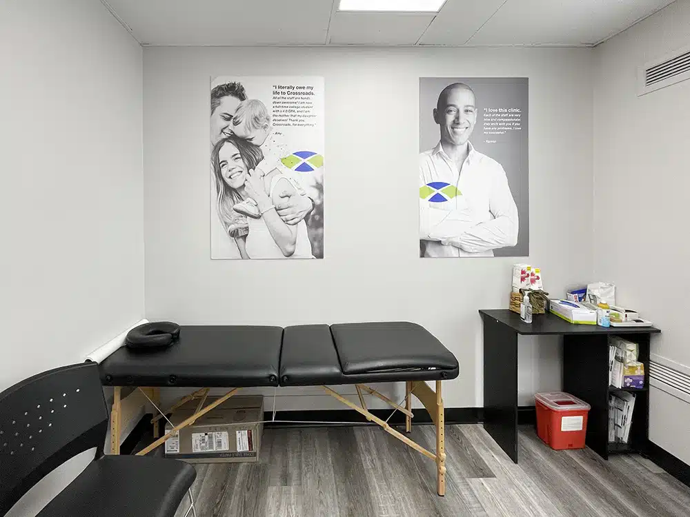 Treatment room with exam table and medical supplies