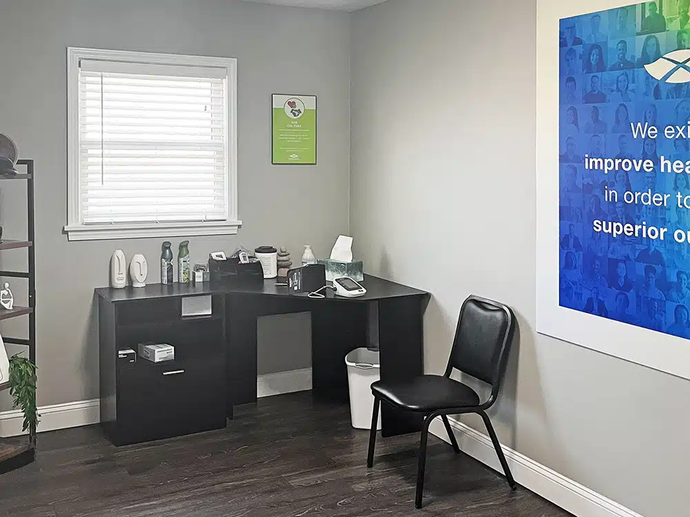 Counseling office with desk, supplies, and patient chair