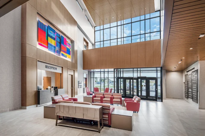 Spacious lobby with seating and reception desk