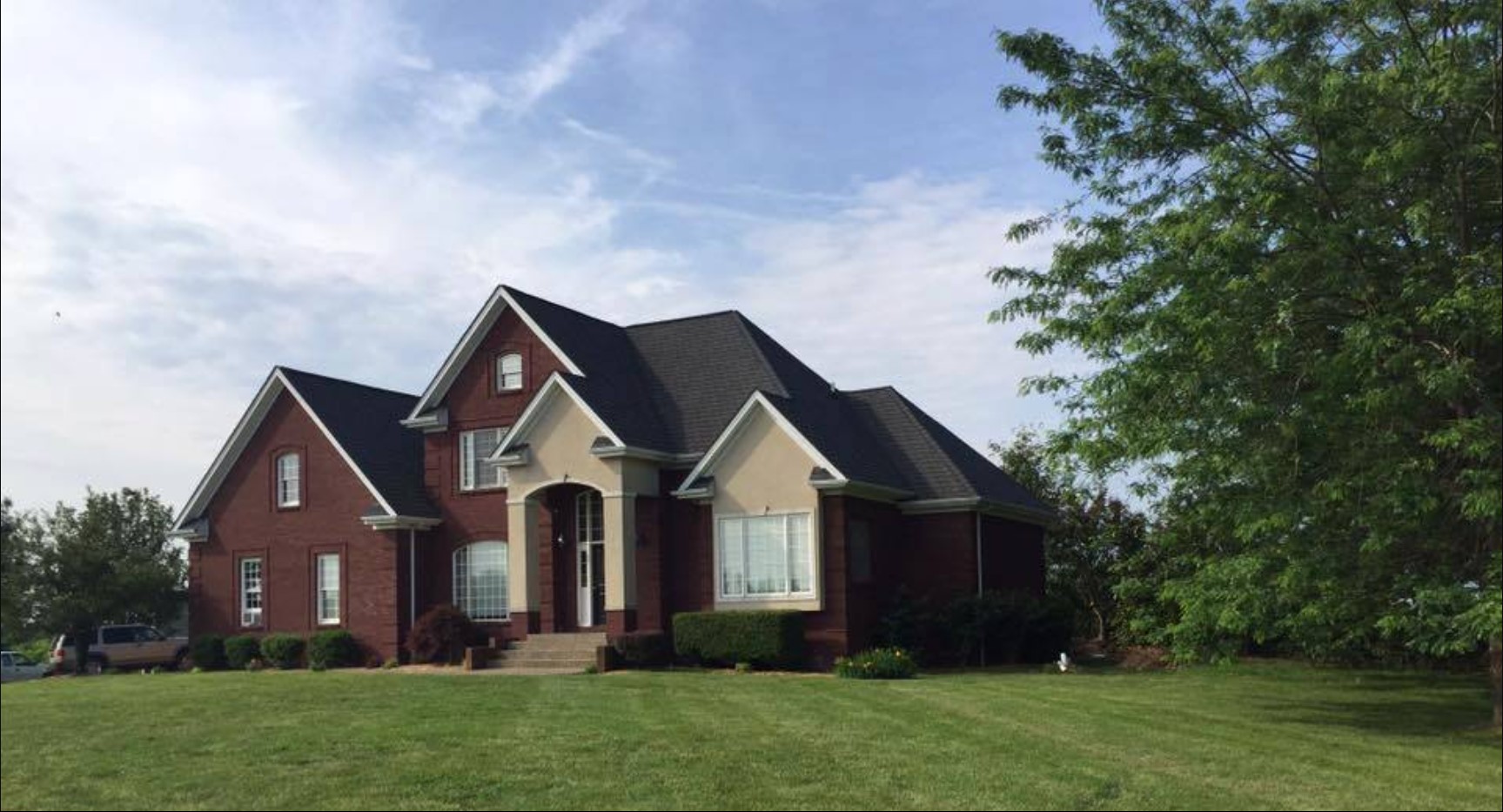 Exterior view of the rehab facility on a lawn.