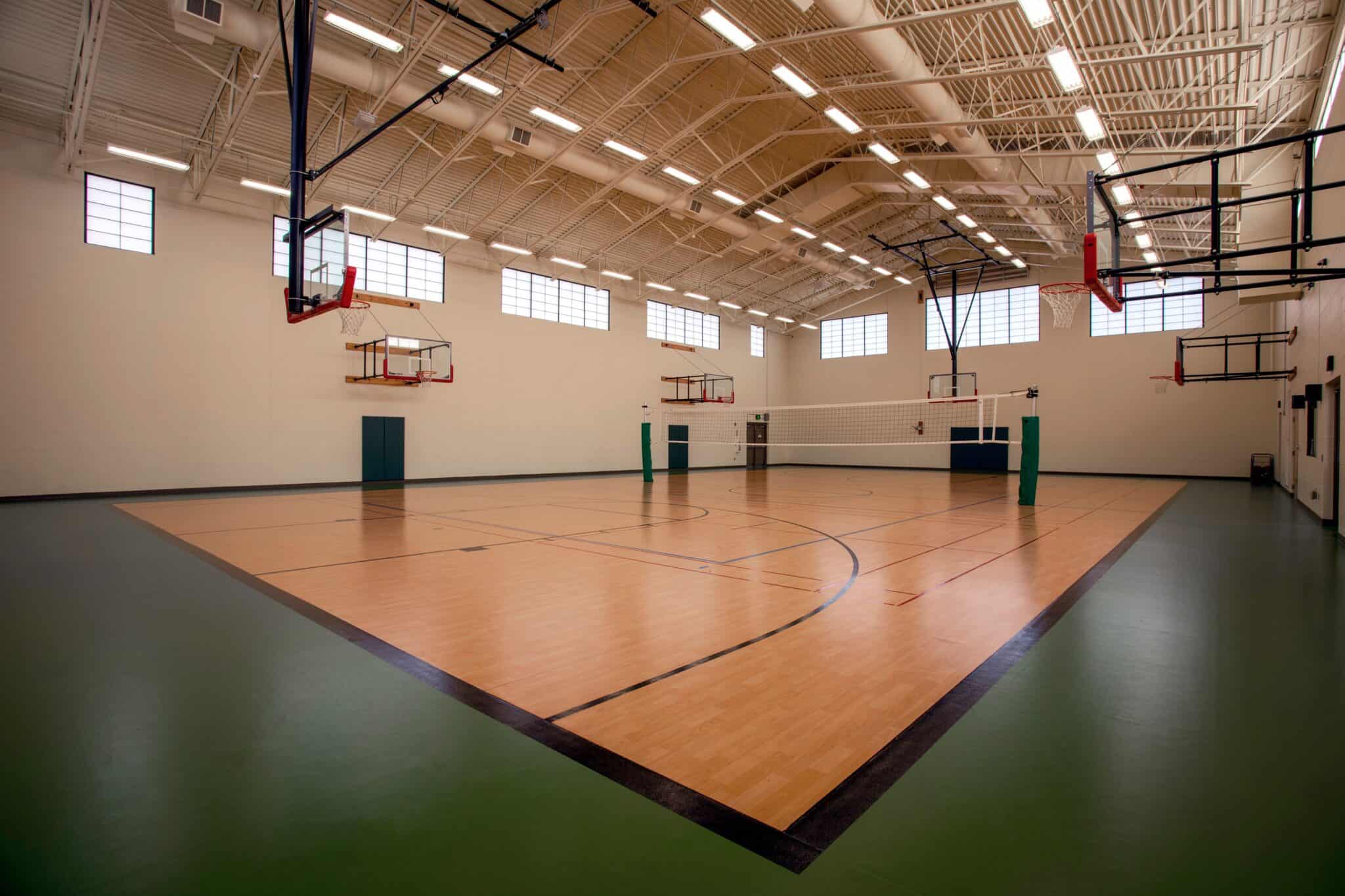 Indoor basketball and volleyball court with high ceilings