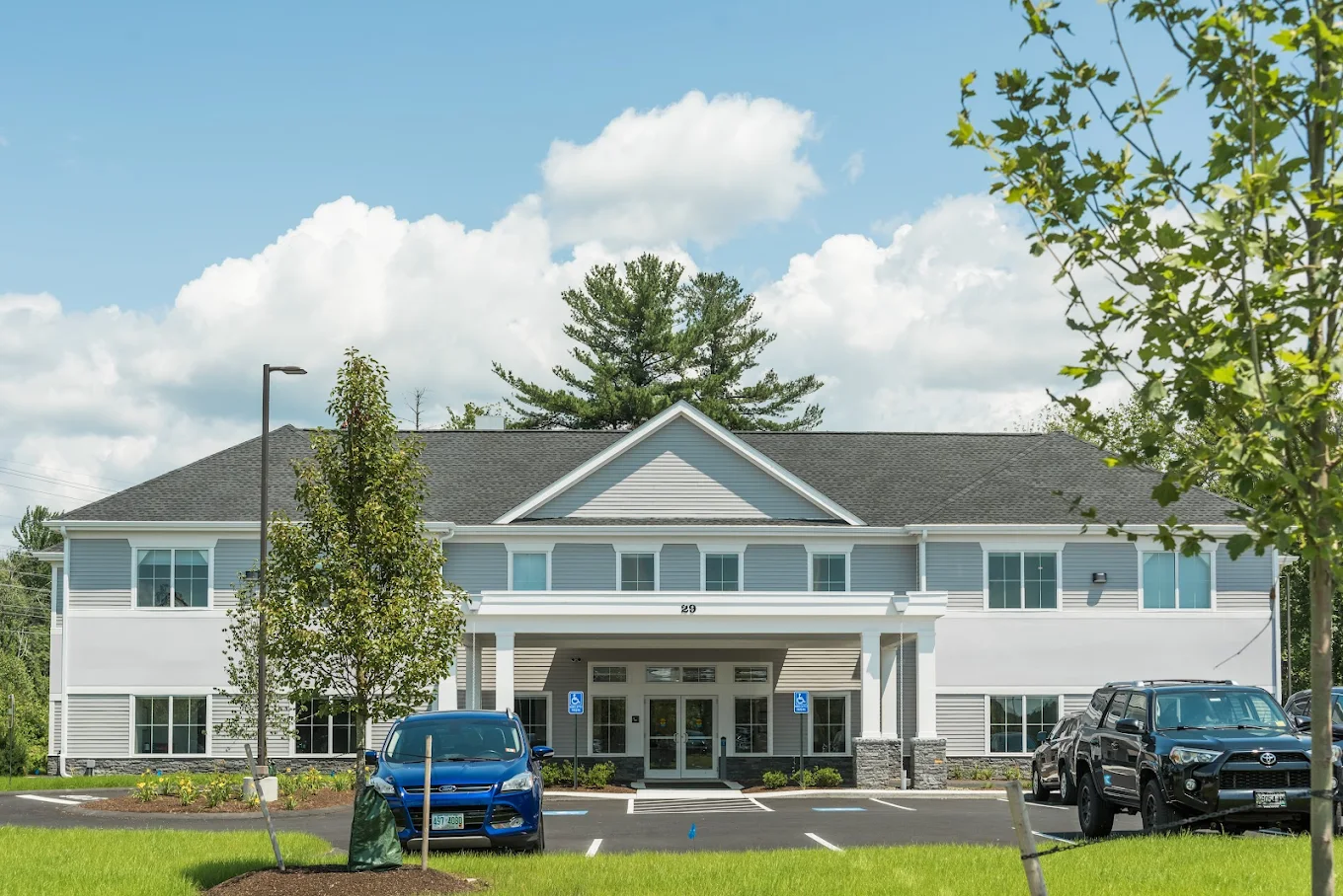 Glass double doors leading into rehab facility lobby