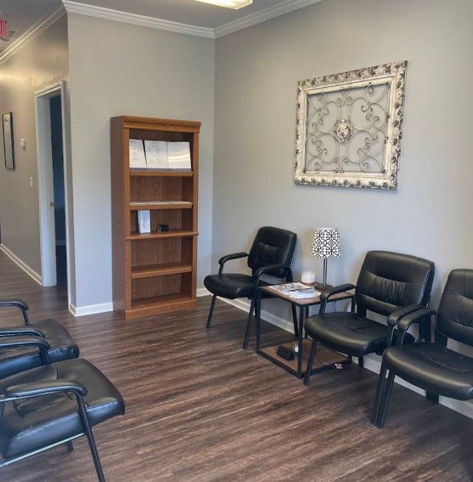 Waiting room with chairs and side table