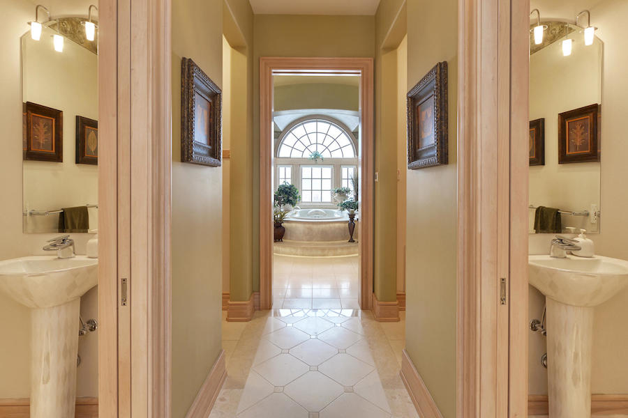 Luxurious bathroom with twin sinks and spa tub