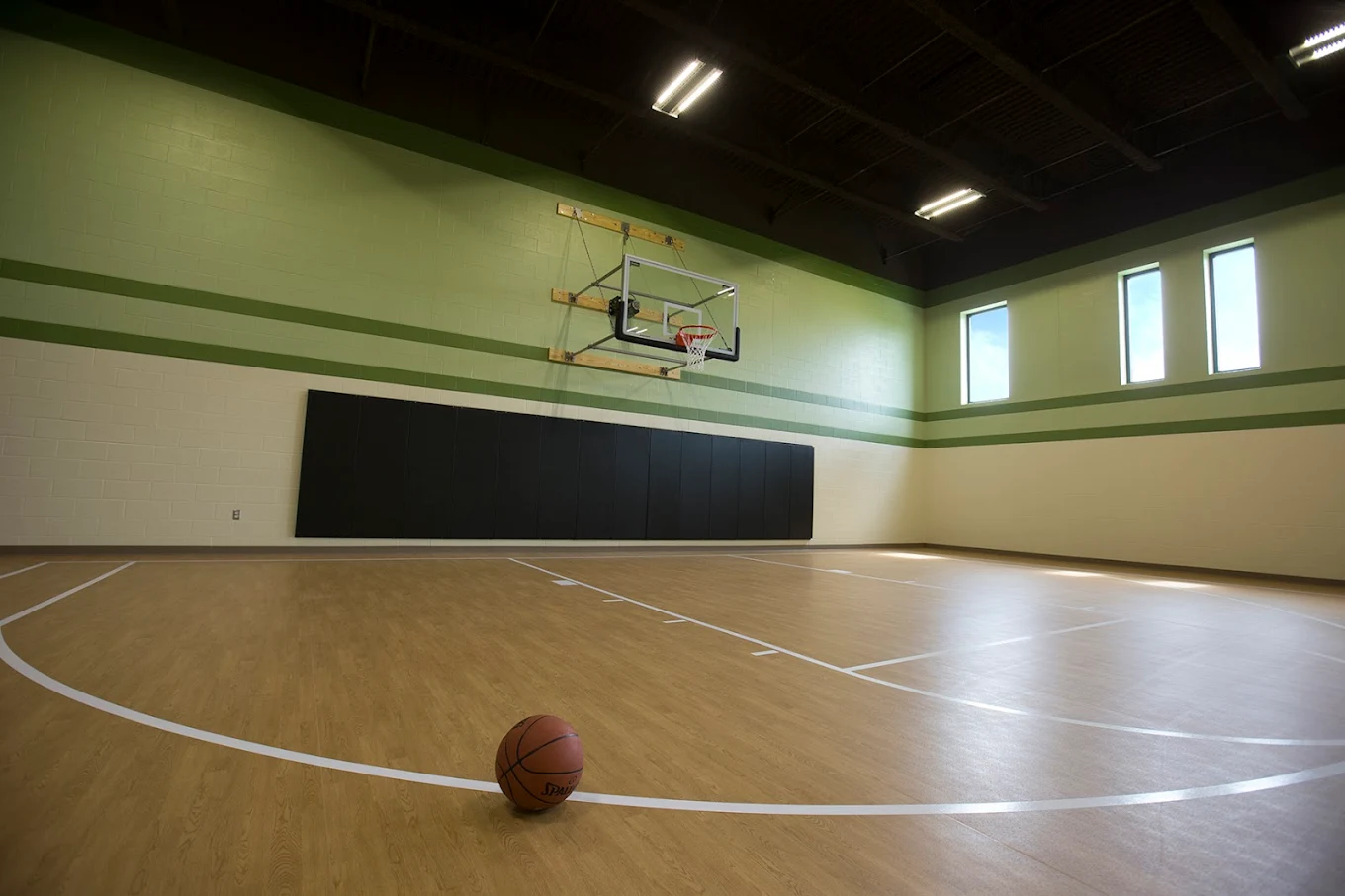 Modern indoor basketball court for fitness and recreation