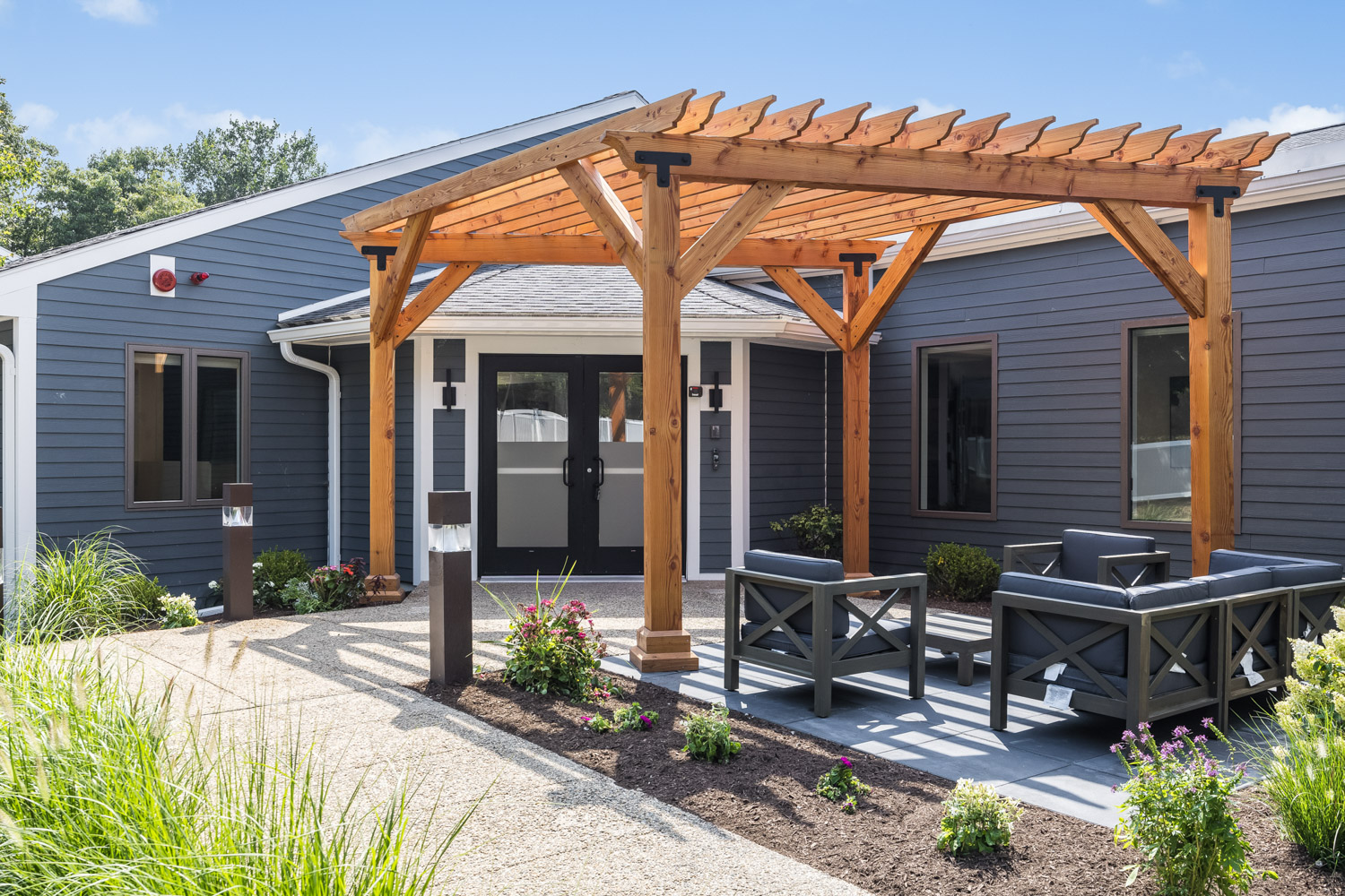 Outdoor lounge with pergola and seating