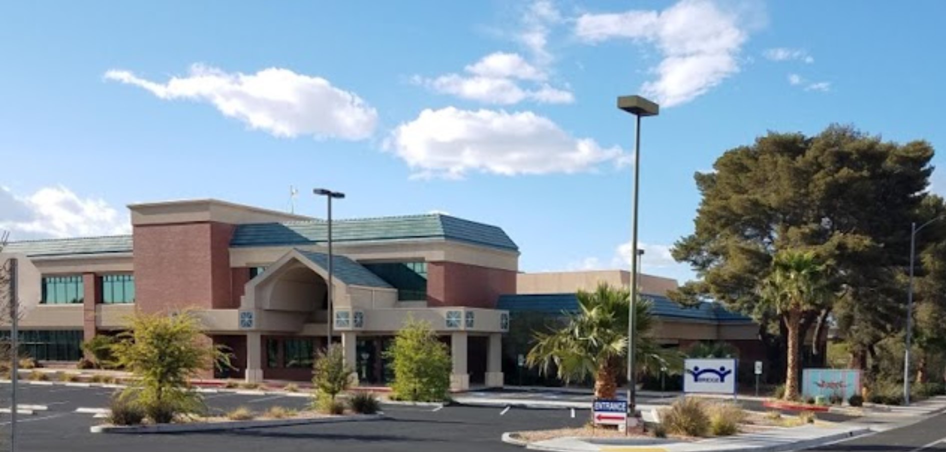 Expansive view of Bridge Counseling Associates in Las Vegas, with a modern design and ample parking.