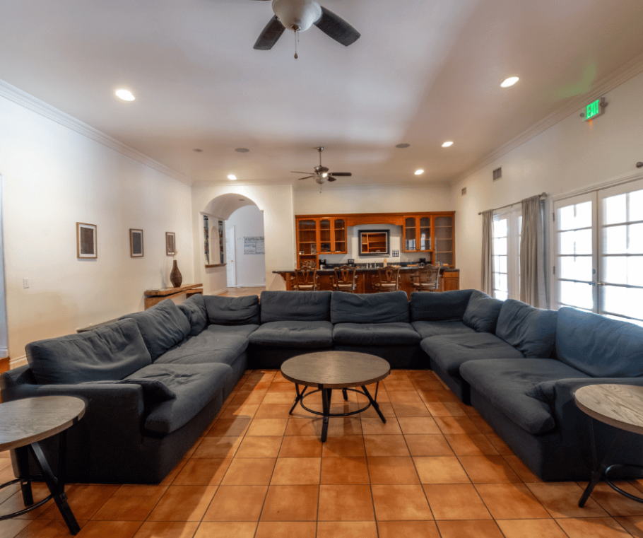 Spacious living room with sectional sofas and seating